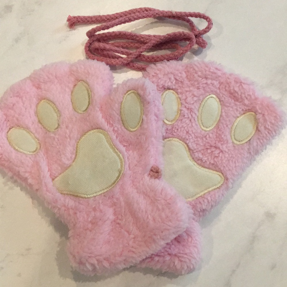 Pink fuzzy fingerless gloves